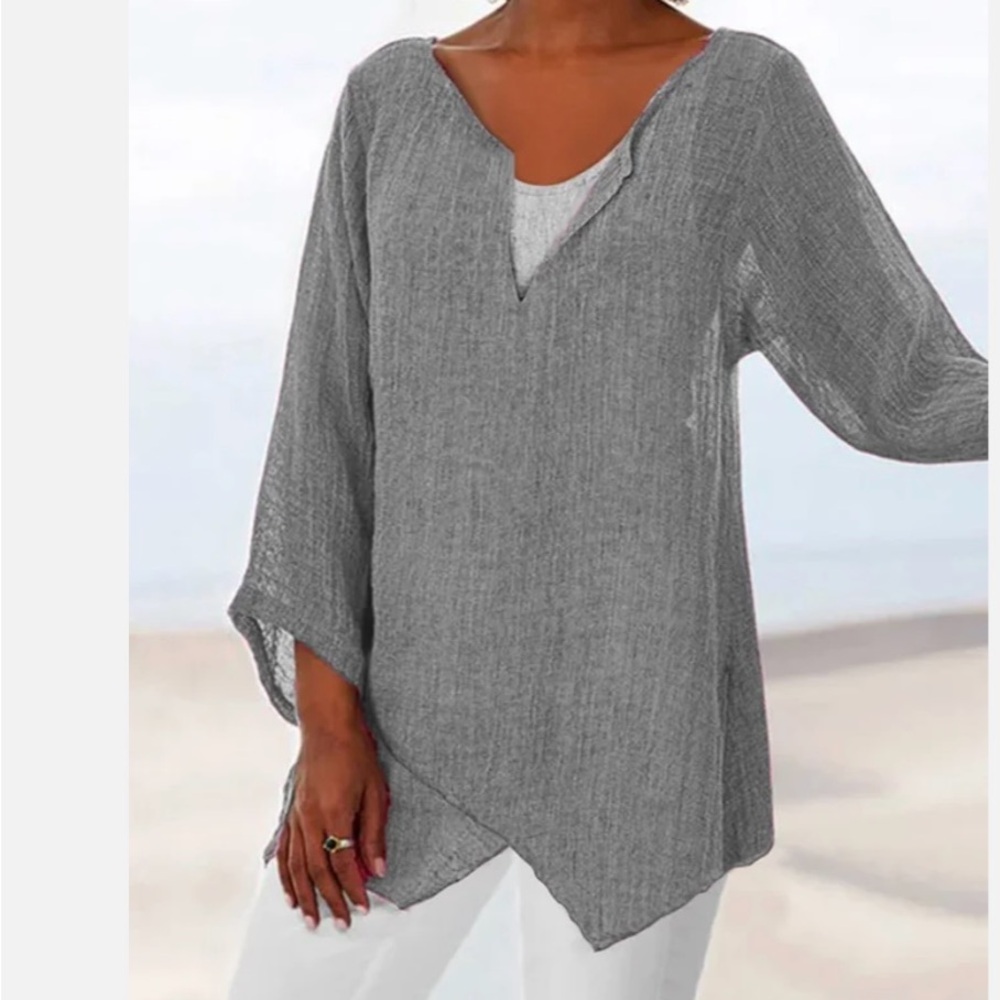 Asymmetric hem loose fit top